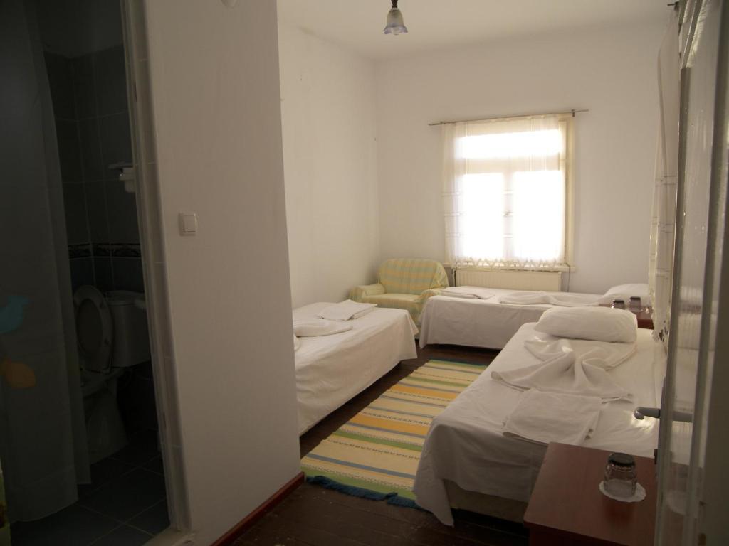Отель Mavi Pension Айвалык Экстерьер фото